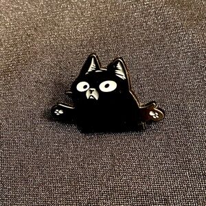 Shrug Kitty: Either she doesn’t know or she doesn’t care | Enamel pin or magnet